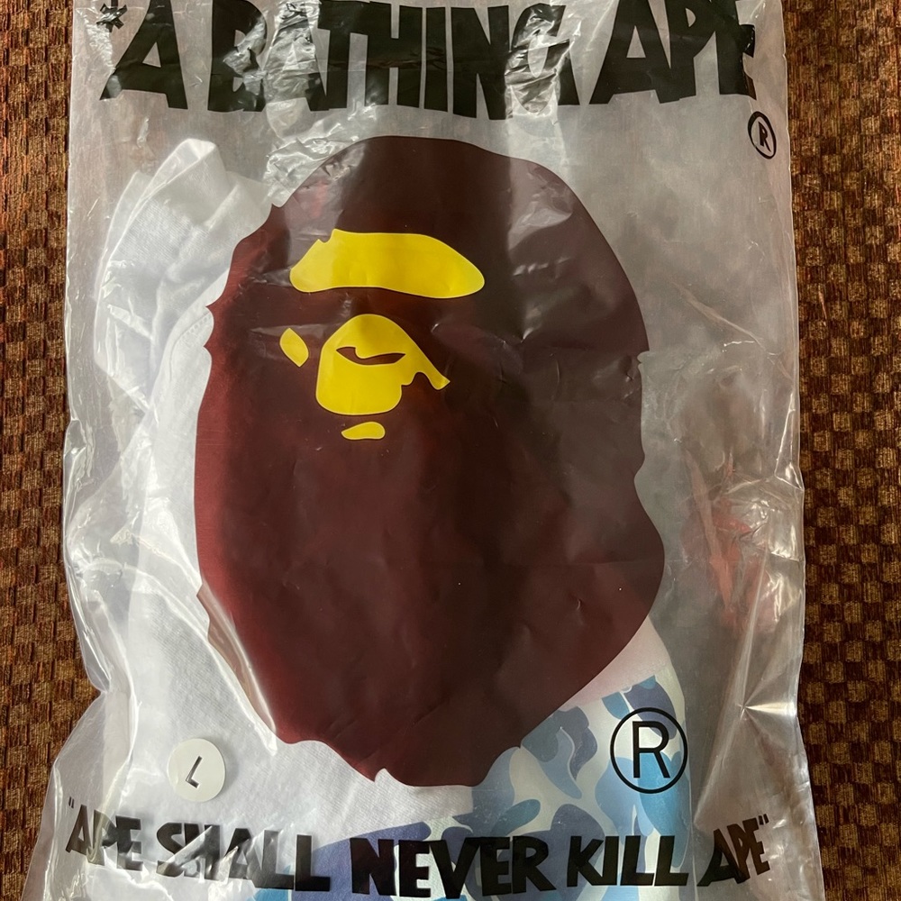 Blue and white authentic bape shirt with bag